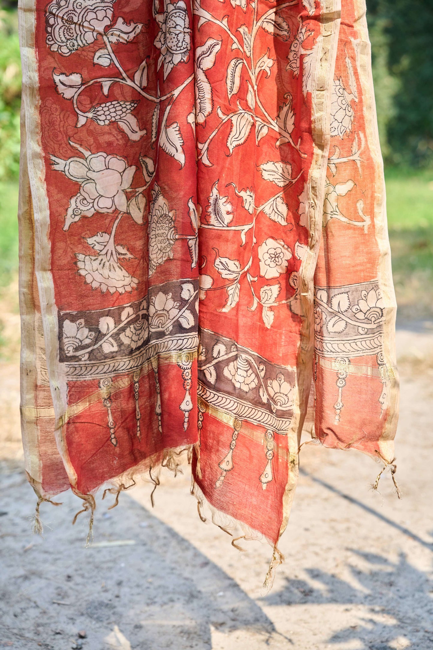 multicolor; gold; floral; bronze; red silk Rust Red Chanderi Silk Dupatta with Floral Kalamkari - Rustic Blossom by Label A